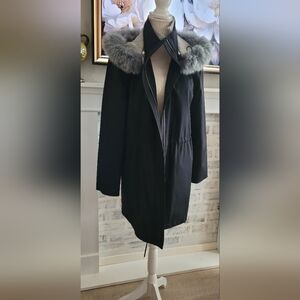 Reversible Jacket with detachable hood.